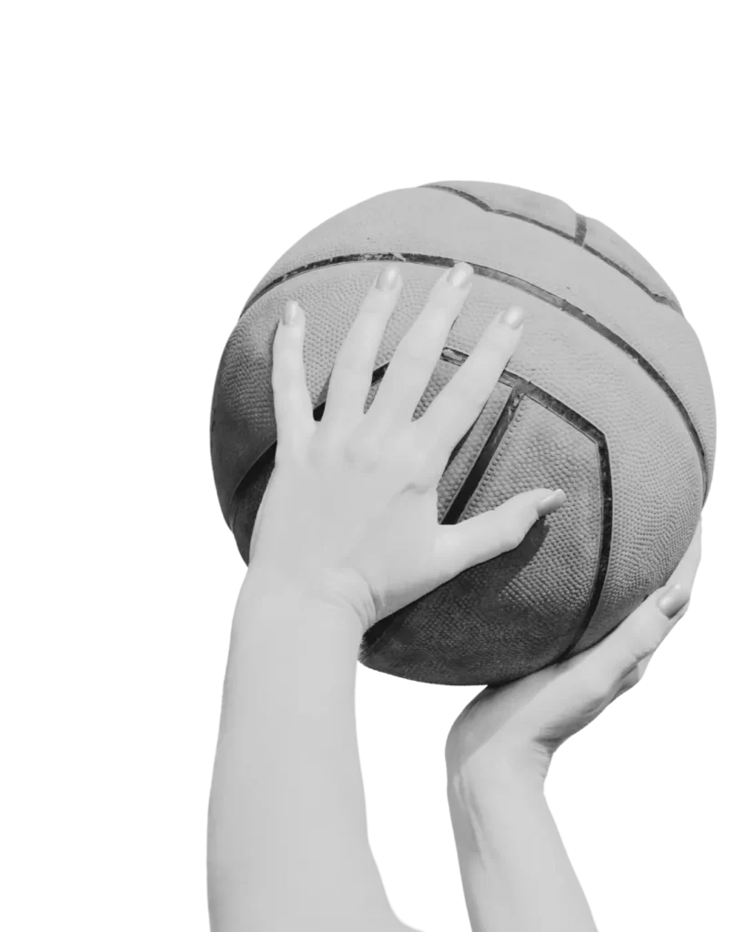 woman-basketball-cover Image of hands holding basketball in black and white
