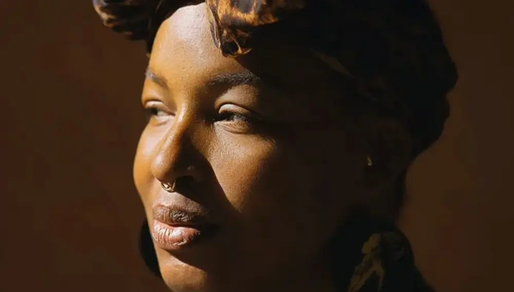 Headshot portrait of Erin Corine