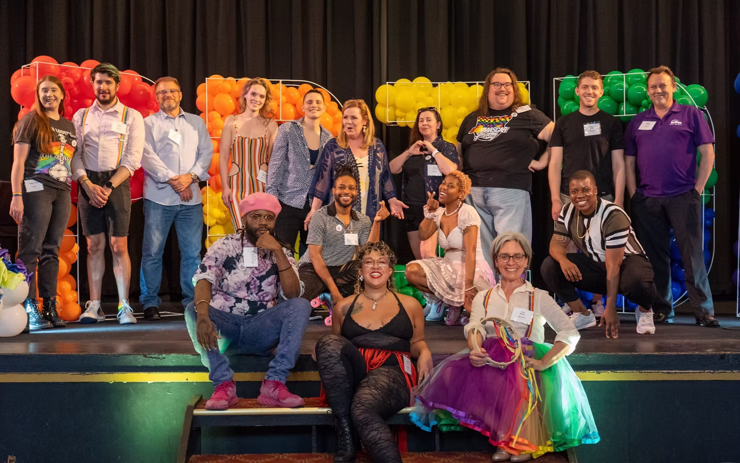 Group photo of performers, vendors, and attendees at the 2023 ILEA Seattle Pride Extravaganza