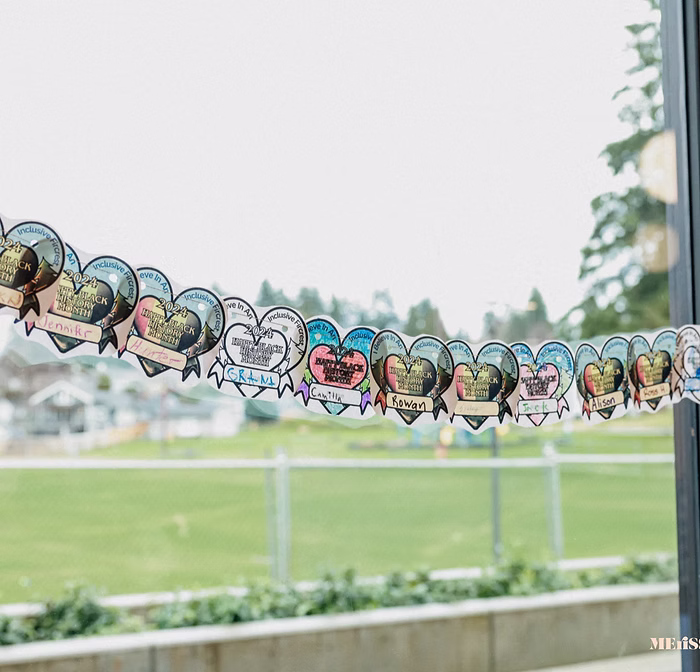 Community art installation created during the Fircrest Black History Month celebration featuring colorful heart-shaped contributions from attendees.