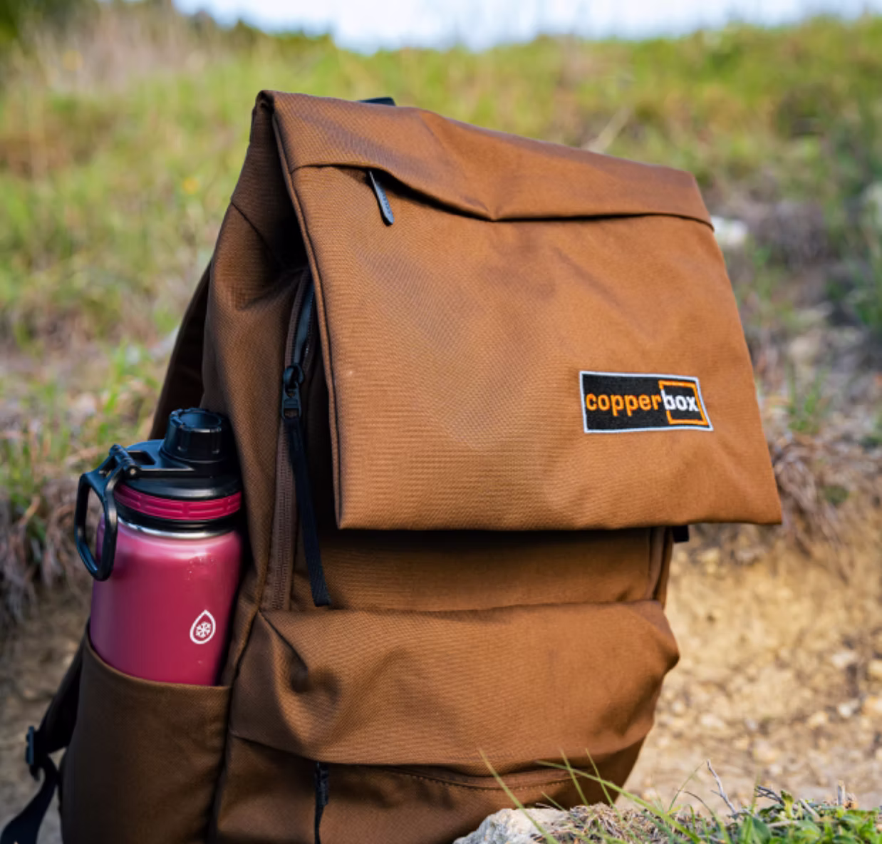 Copperbox branded executive daypack with a reusable water bottle prepared for attendees at the SXSW leadership retreat.
