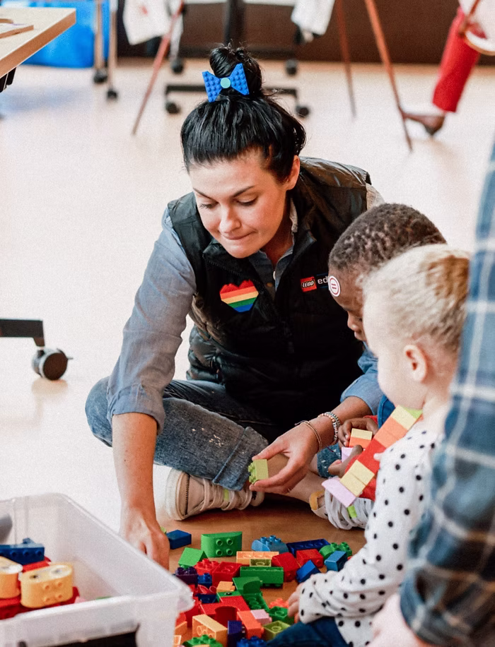 Children participating in a LEGO activity station during the Fircrest Black History Month community celebration.