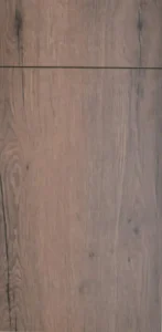 Frameless cabinet door in rustic weathered wood tone with natural knots and texture.
