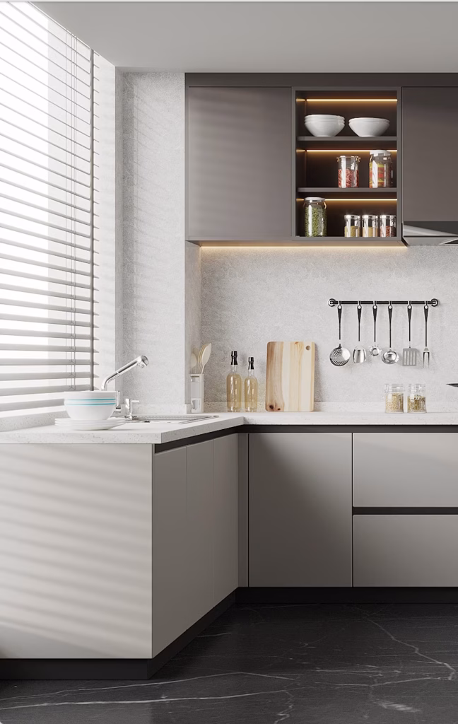 Corner view of a minimalist kitchen designed by Iconic Cabinetry in Lynnwood, showcasing matte flat-panel cabinets, quartz countertops, and integrated under-cabinet lighting.